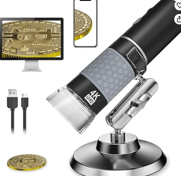 Digital microscope with black body on metal stand, shown with USB cable, smartphone display, and desktop monitor showing magnified coin images